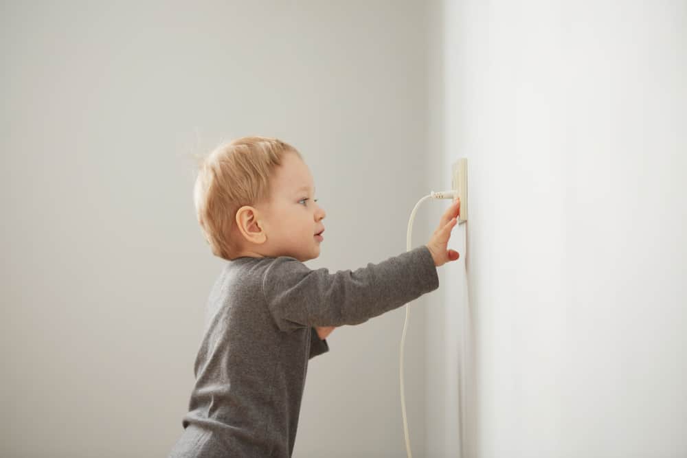 Child near electrical outlet