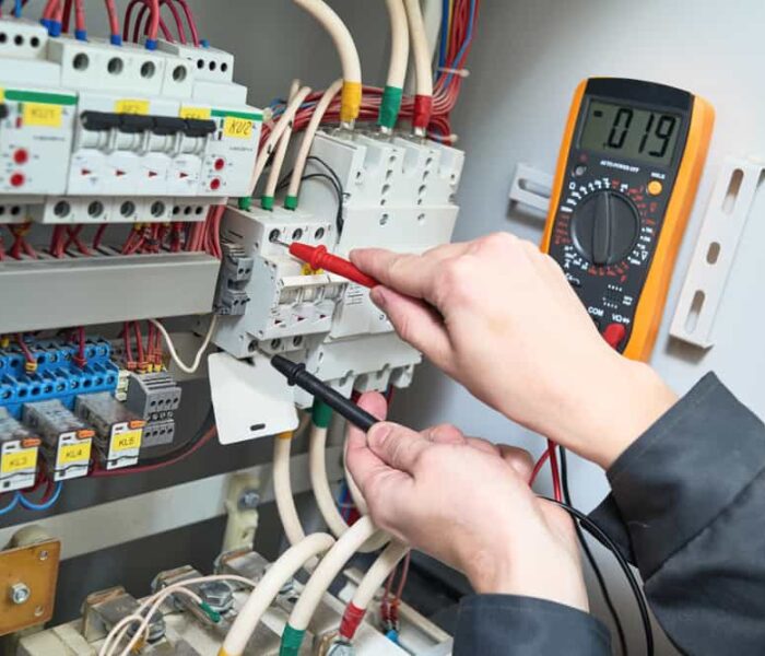 Electrician,Measurements,With,Multimeter,Tester